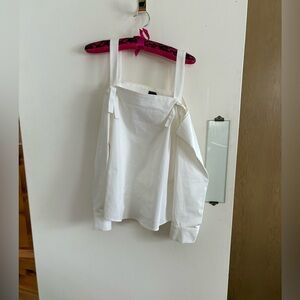 Crisp white cotton open shoulder blouse with tie like detail at straps